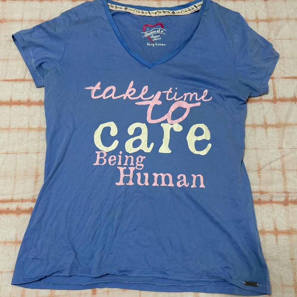being human blue v neck shirt style with graphic letter short sleeve